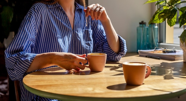 Intimate tea tasting session with elegant teaware and multiple tea varieties